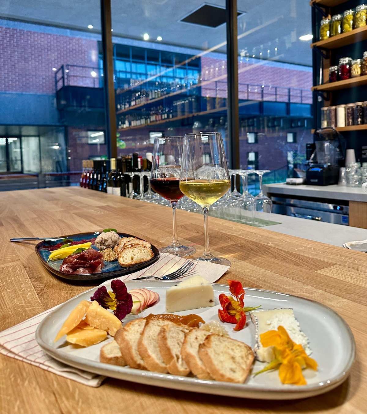 Wine and small plates on the Bistro counter overlooking the courtyard